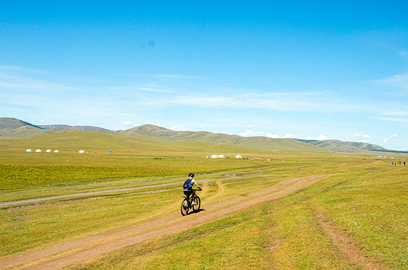 Cycling through Mongolian grassland